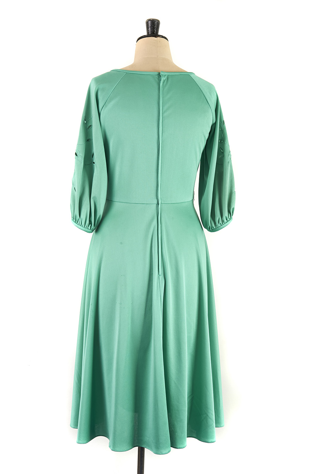 Vintage green dress with detailing on arm