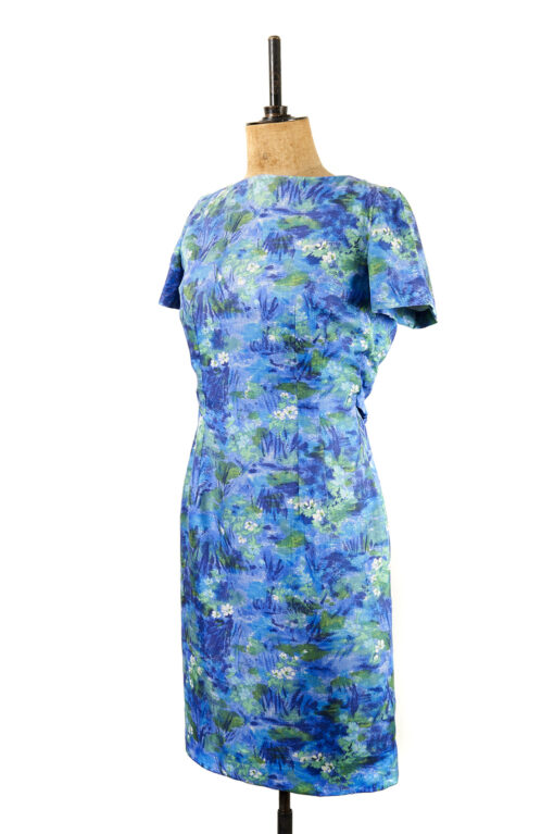 A painterly vintage '50's cocktail dress with a cobalt, green and white floral print. Margot and Hesse vintage dresses online from bridport dorset